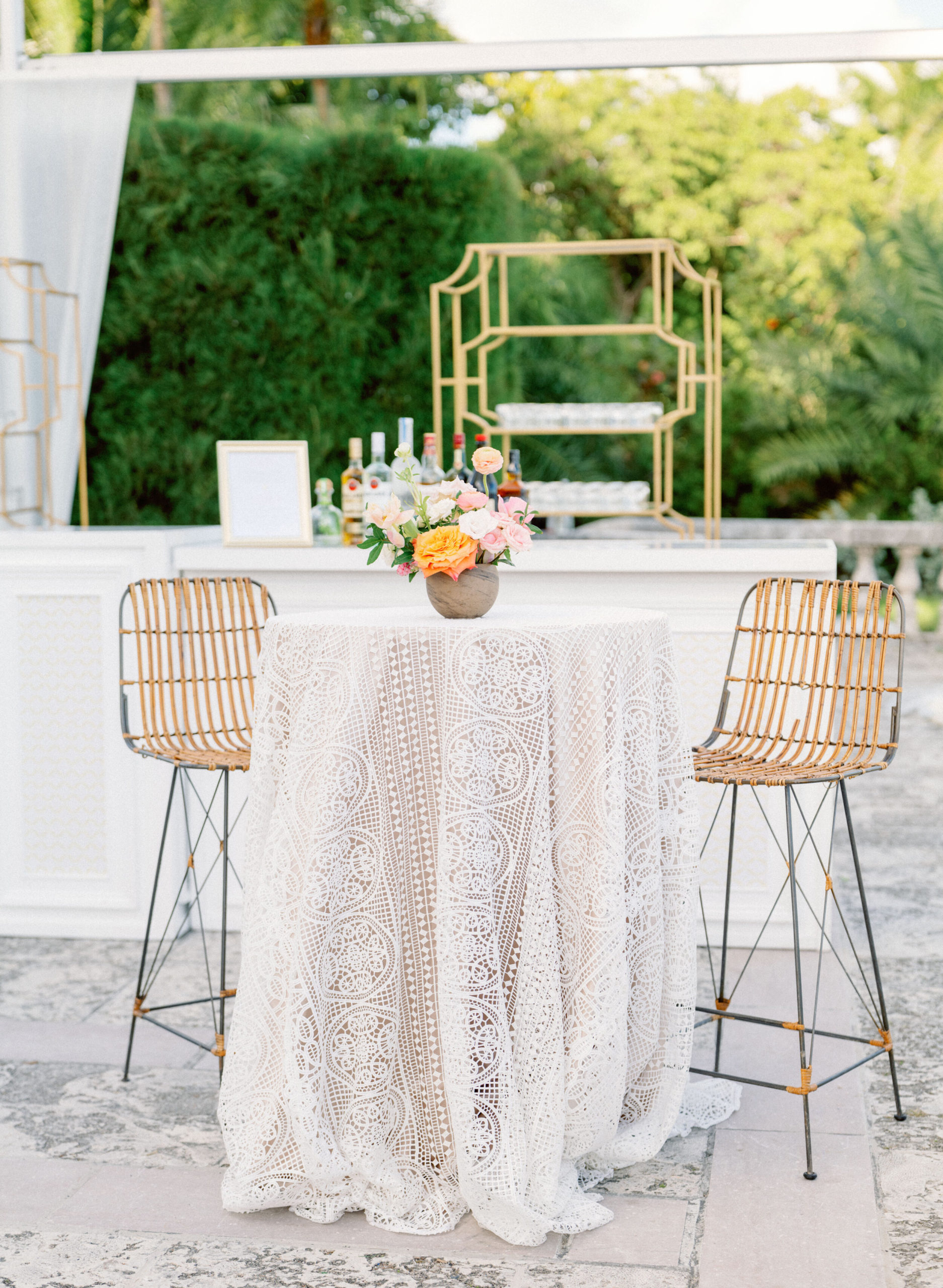 high-top cocktail table with lace linen at Vizcaya Museum