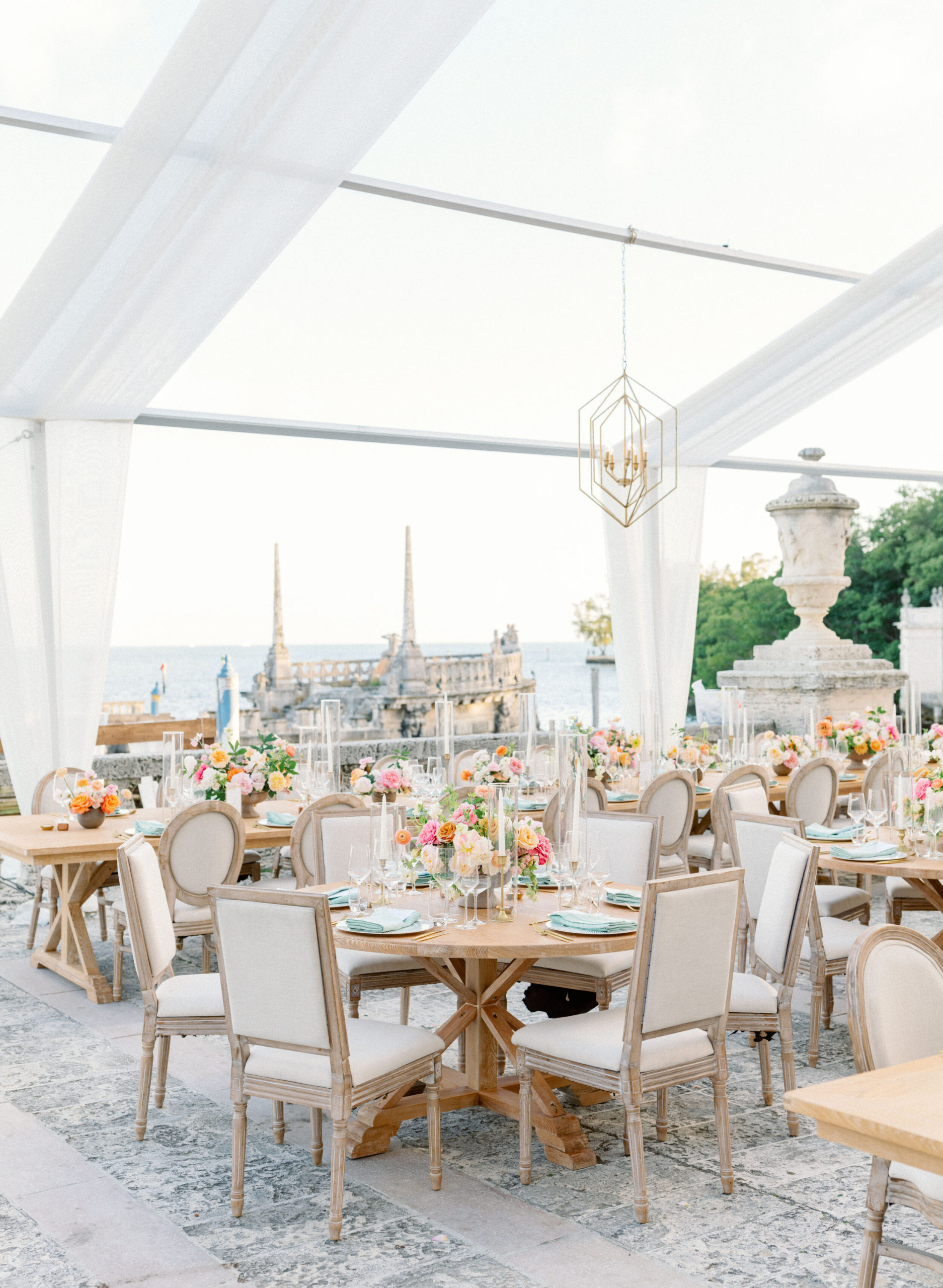 elegant, whimiscal wedding reception on the water at Vizcaya Museum