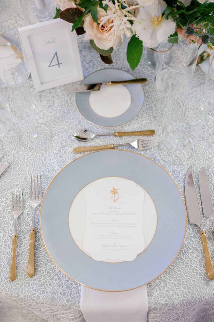blue place setting with gold accents, LaPlaya Beach Resort wedding
