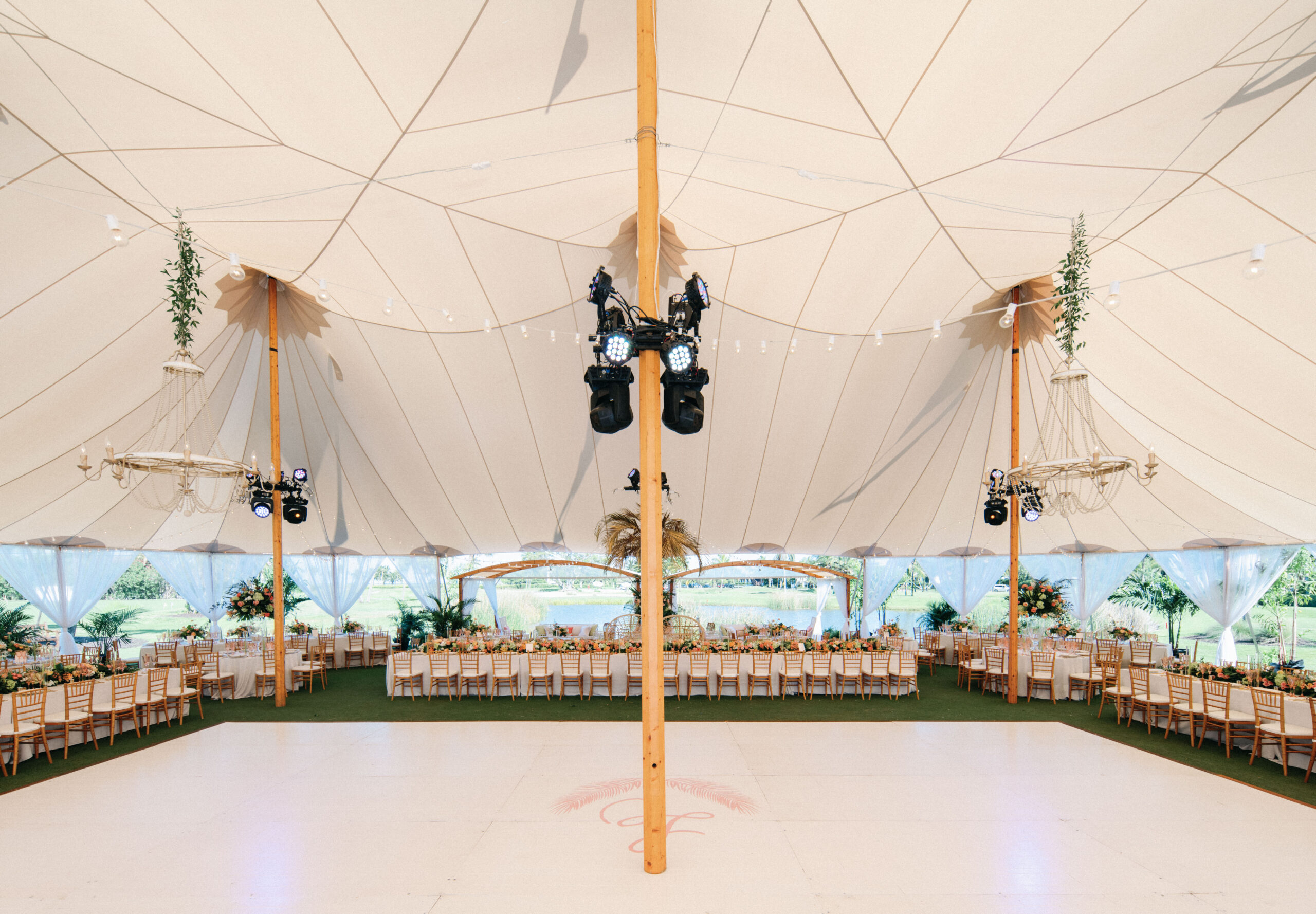 tented wedding set-up with custom white dance floor at Gasparilla Club