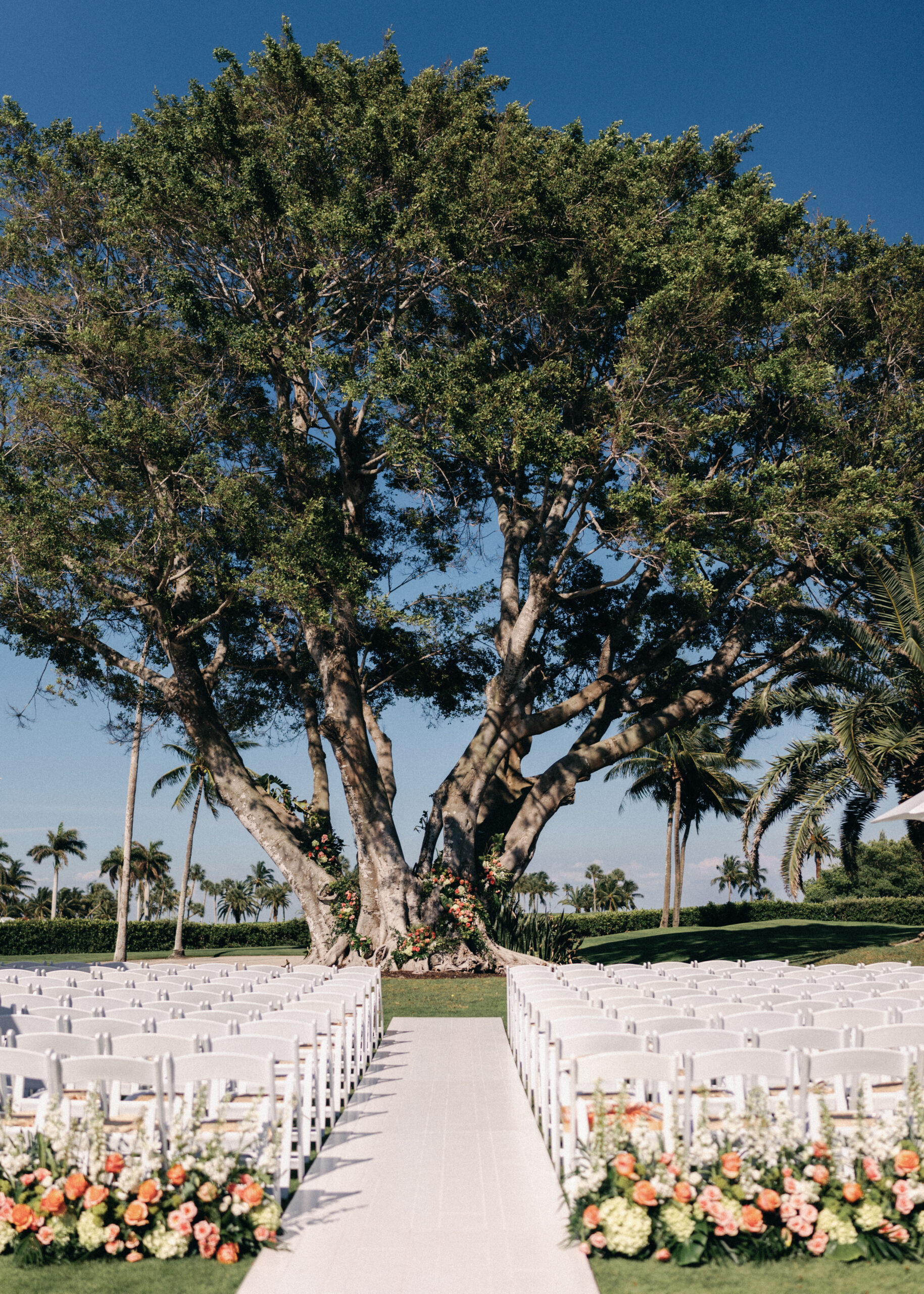 Aisle flowers for outdoor ceremony at Gasparilla Club