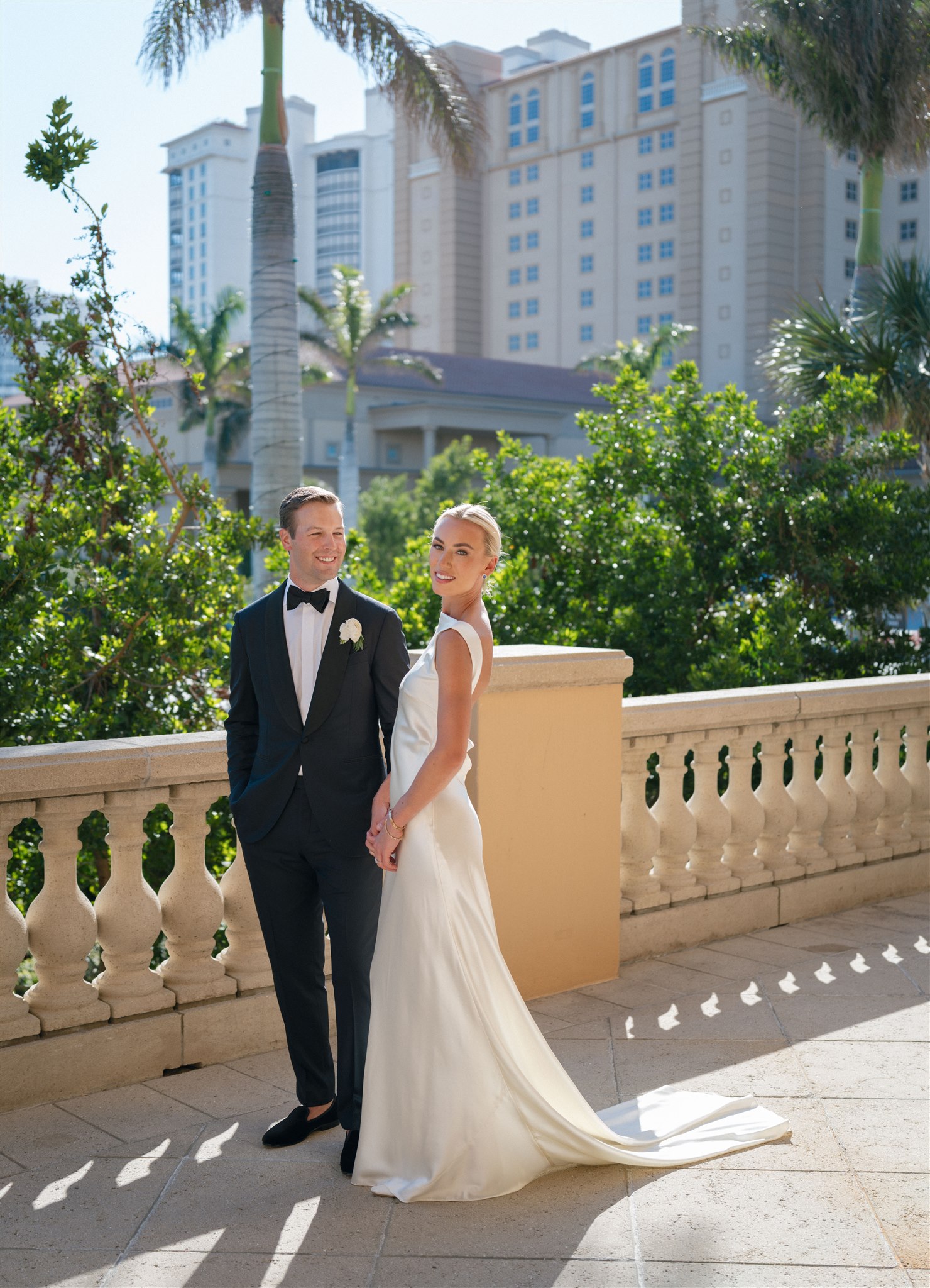 Bride and groom outside of Ritz Carlton Naples