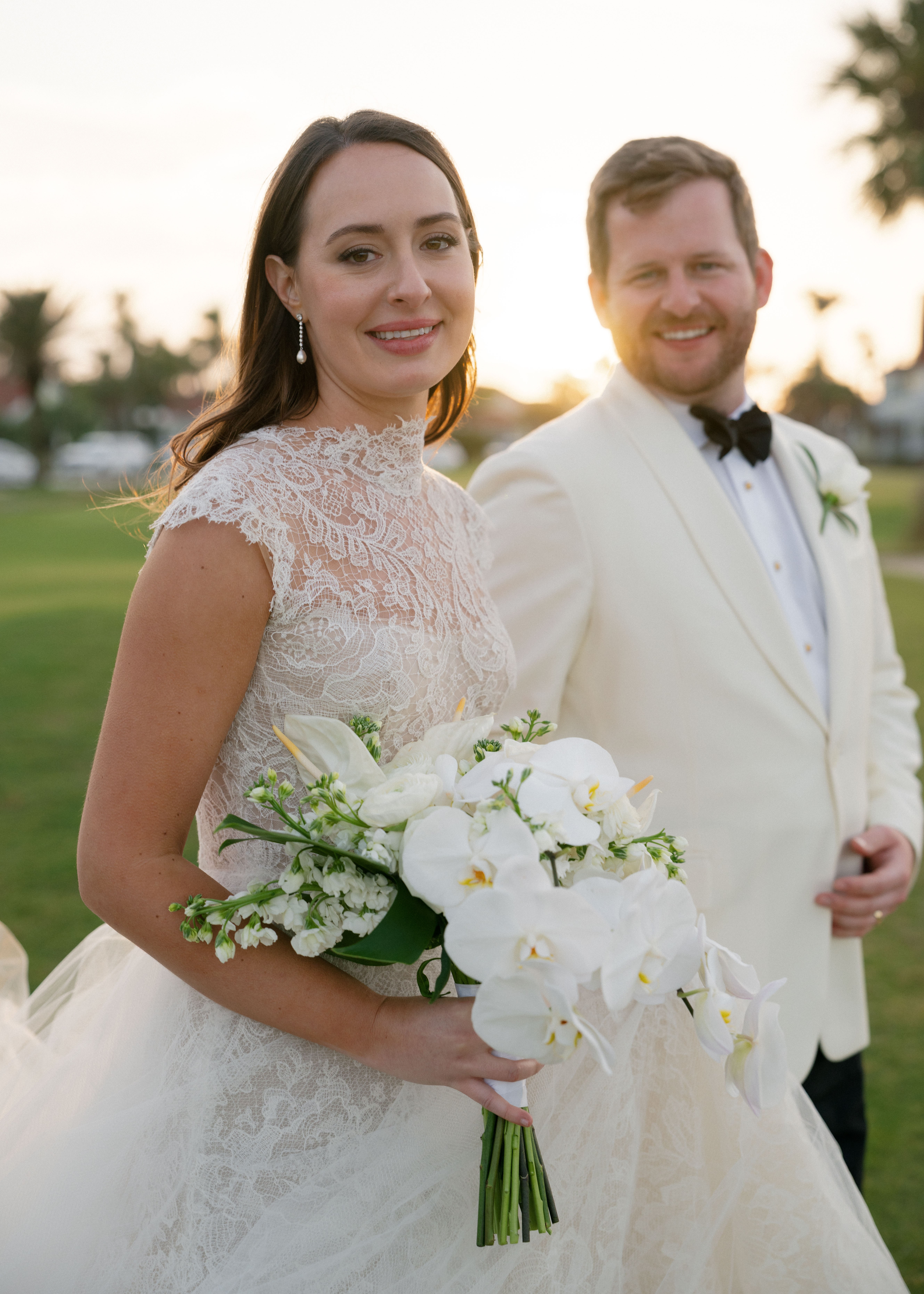 A bride and groom pose during their Florida wedding portraits.