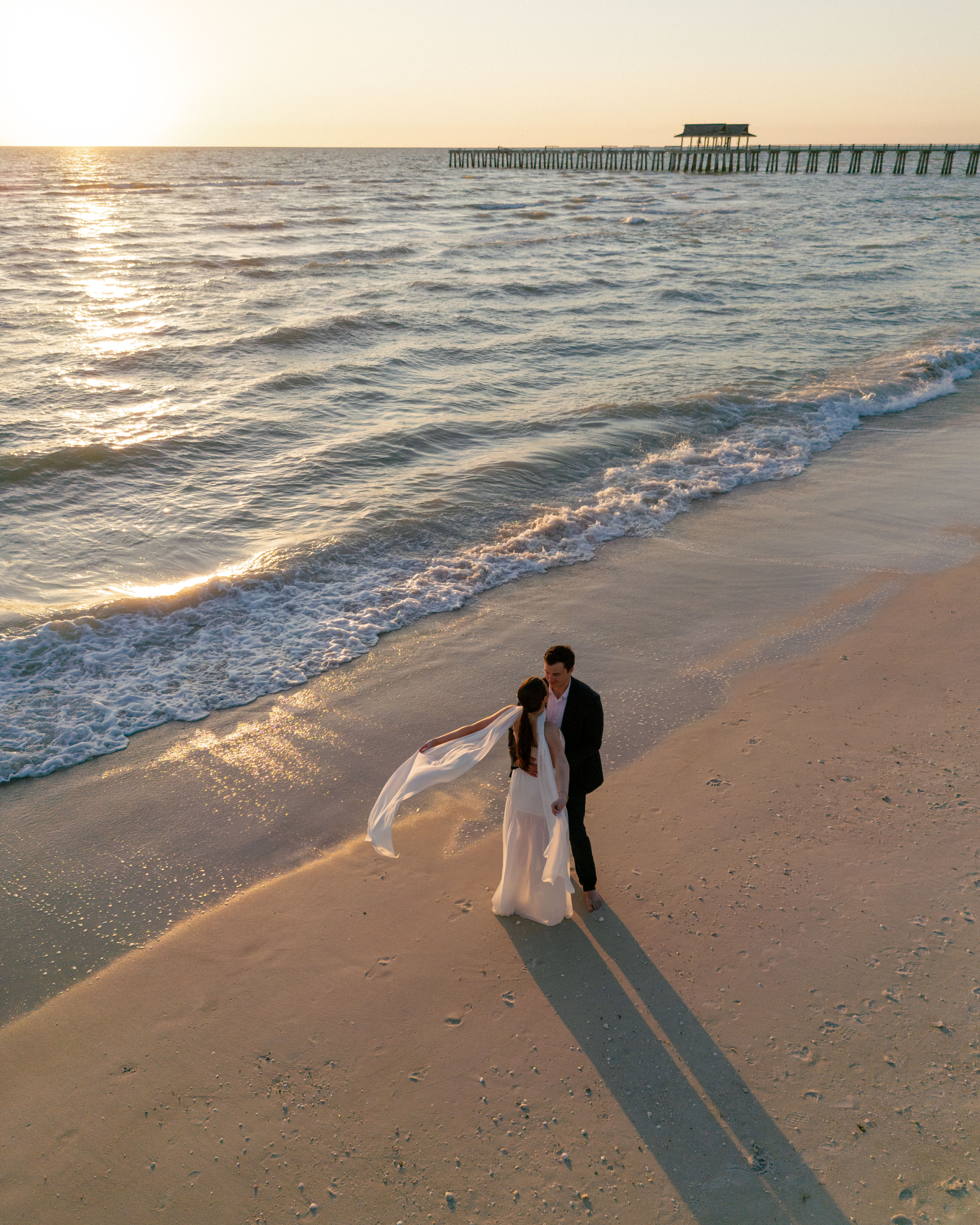 Florida golden hour beach portraits for an engagement session.